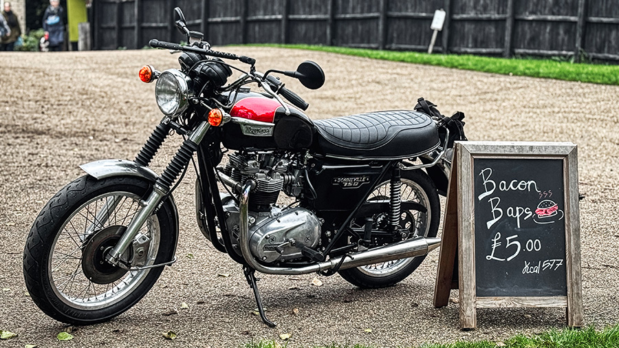 dave clough sat in front of a few of his machines. 